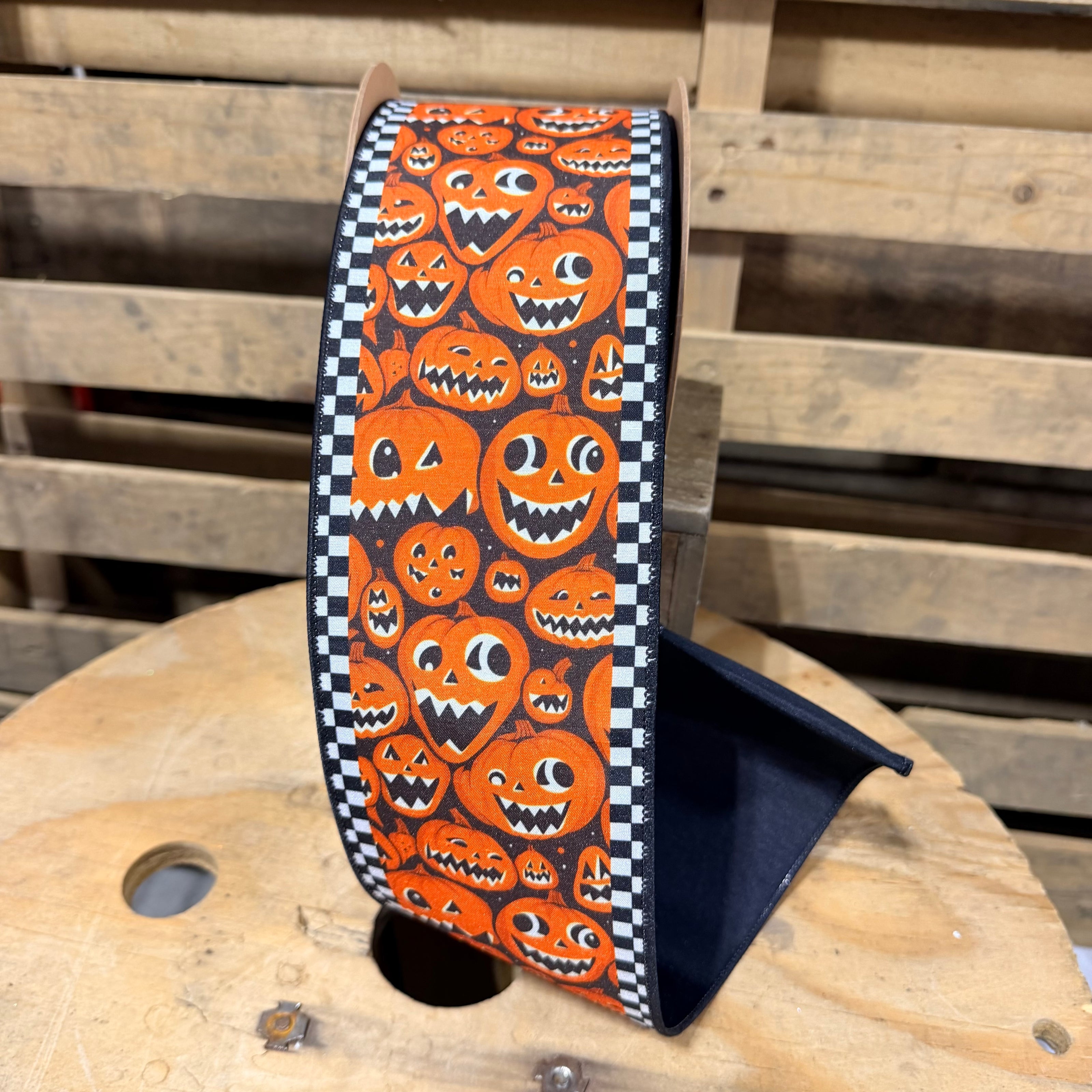 4” x  10yd Jack-o-Lanterns and Check Edging w/ Black Backing Wired Ribbon - 9806W-750-100E