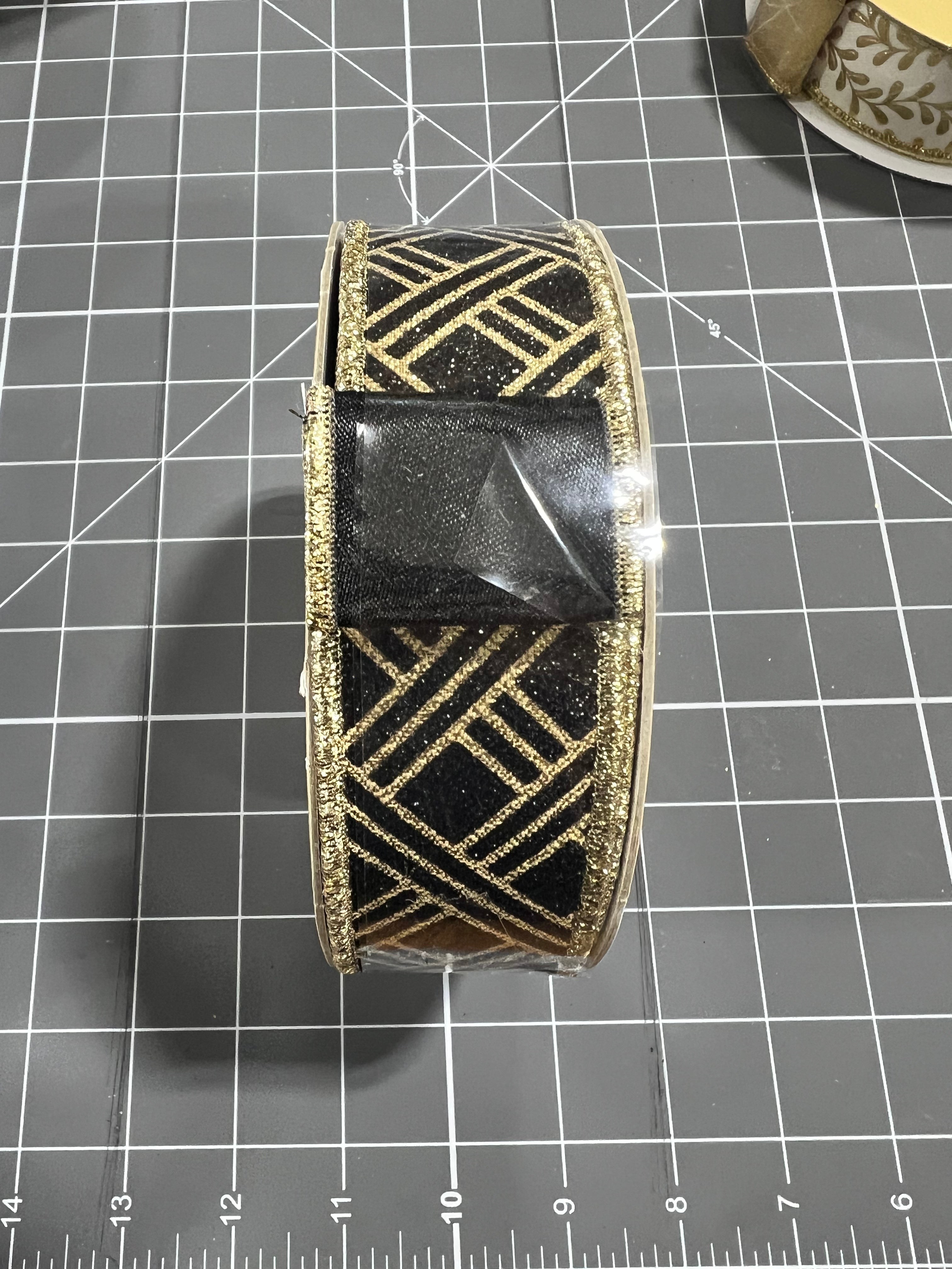 1.5” x 10yd black and gold woven stripe with black backing d’lux ribbon - LX3216RF